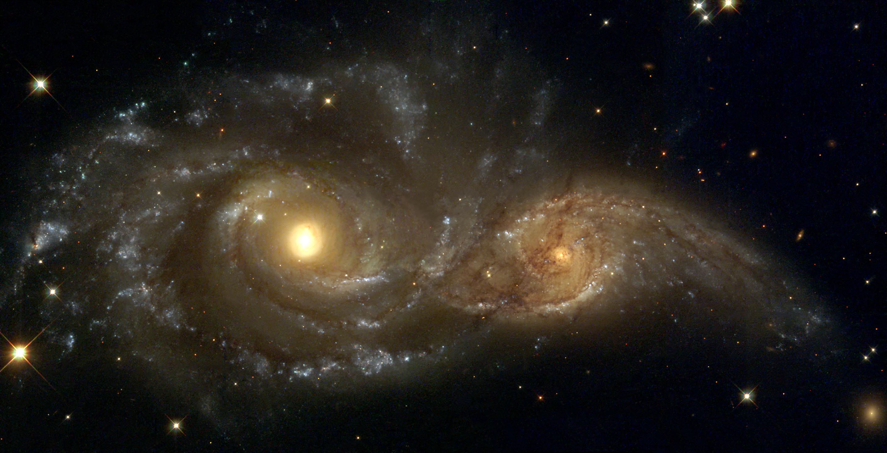 Colliding spiral galaxies.  Source: Debra Meloy Elmegreen/Vassar College/NASA/Hubble 